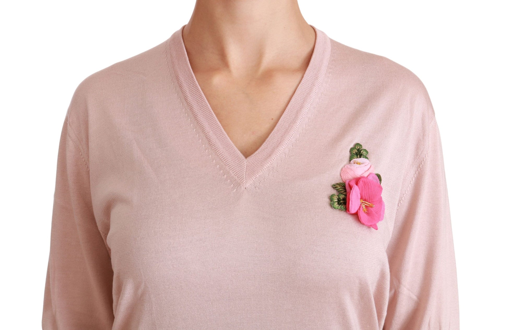 Pink sweater with floral embroidery on chest