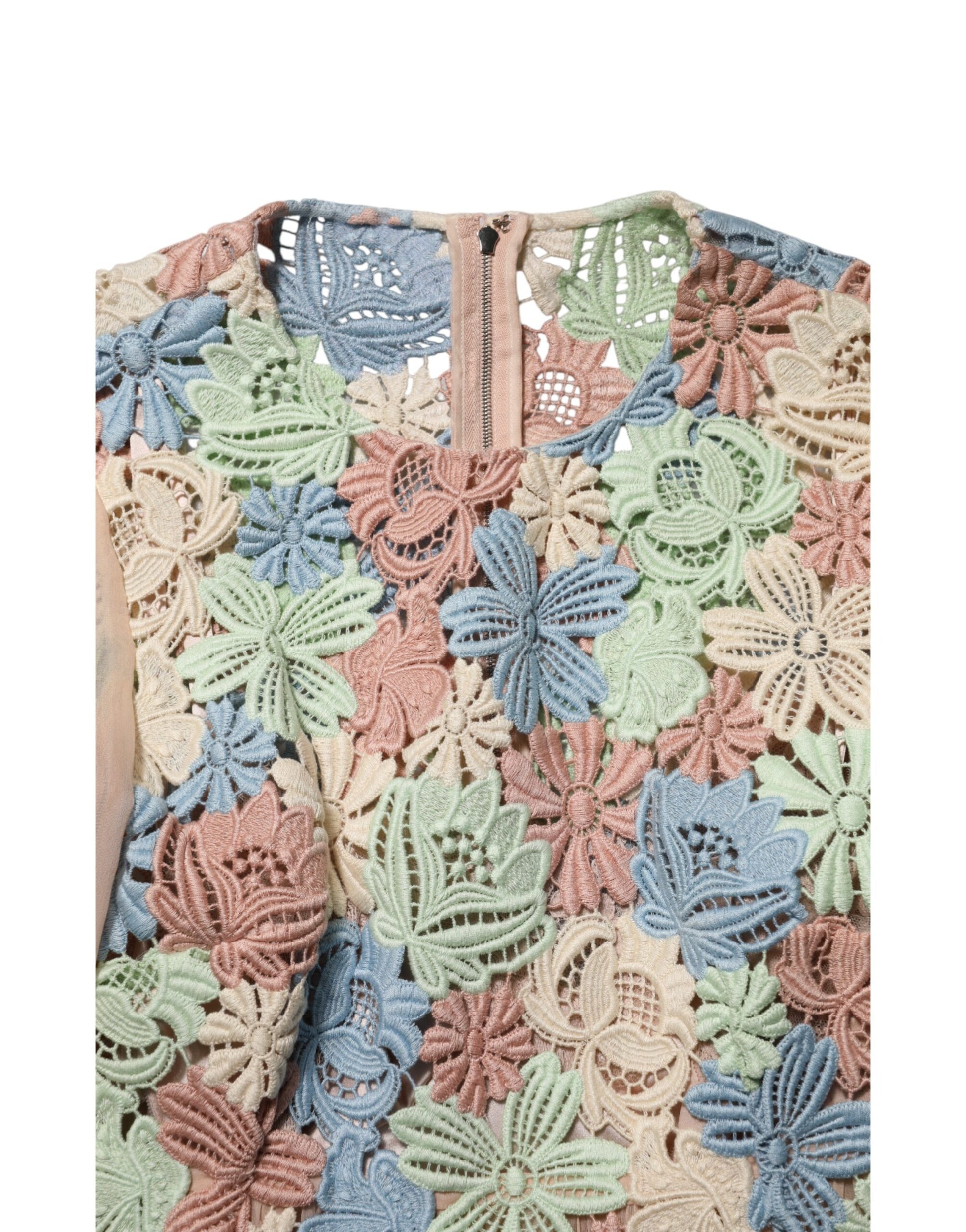 A colorful dress with floral embroidery and pleats. It appears to be an A-line style, possibly made of silk o
