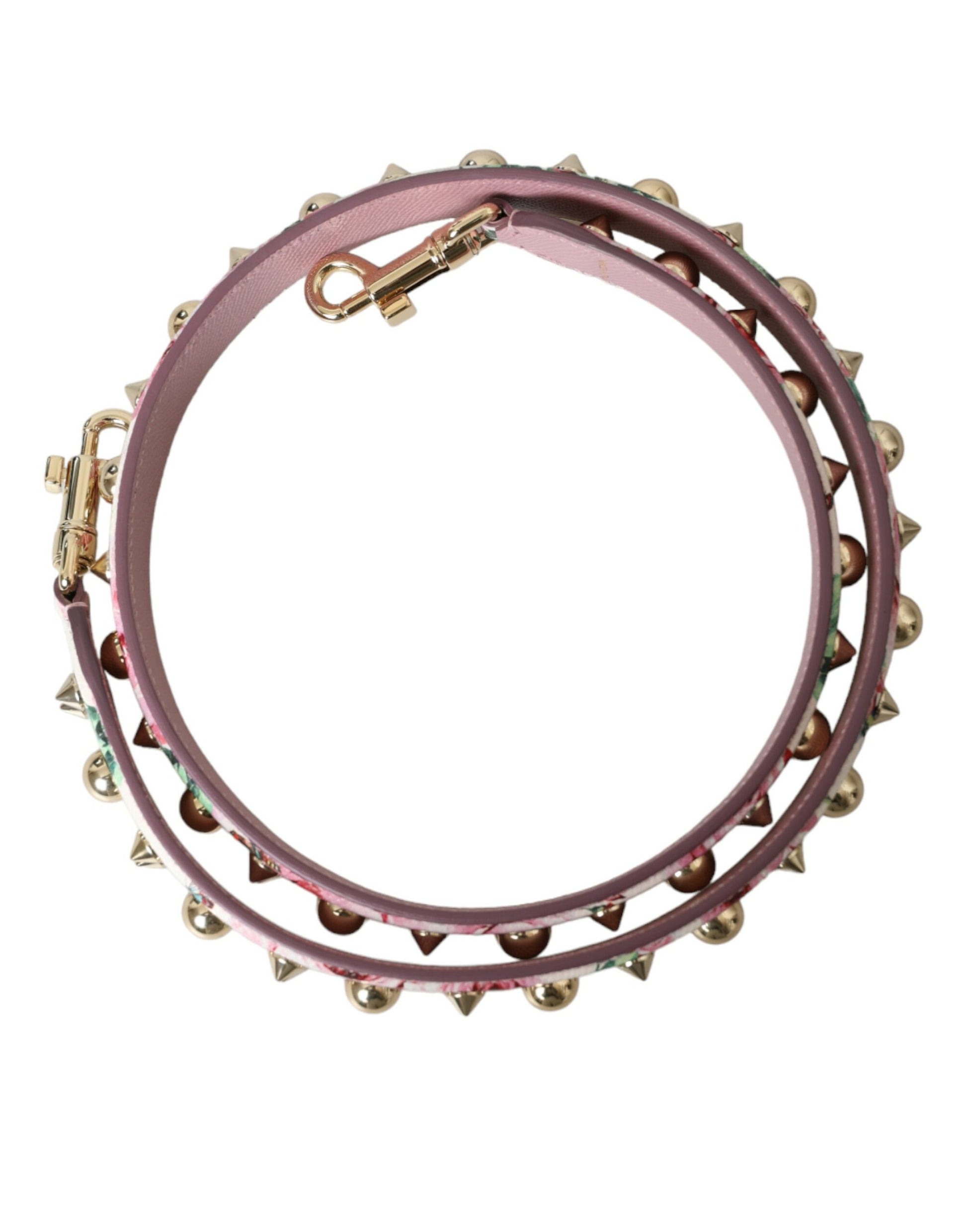 Decorative bracelet with pink stones and gold accents