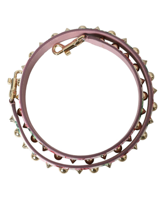 Decorative bracelet with pink stones and gold accents