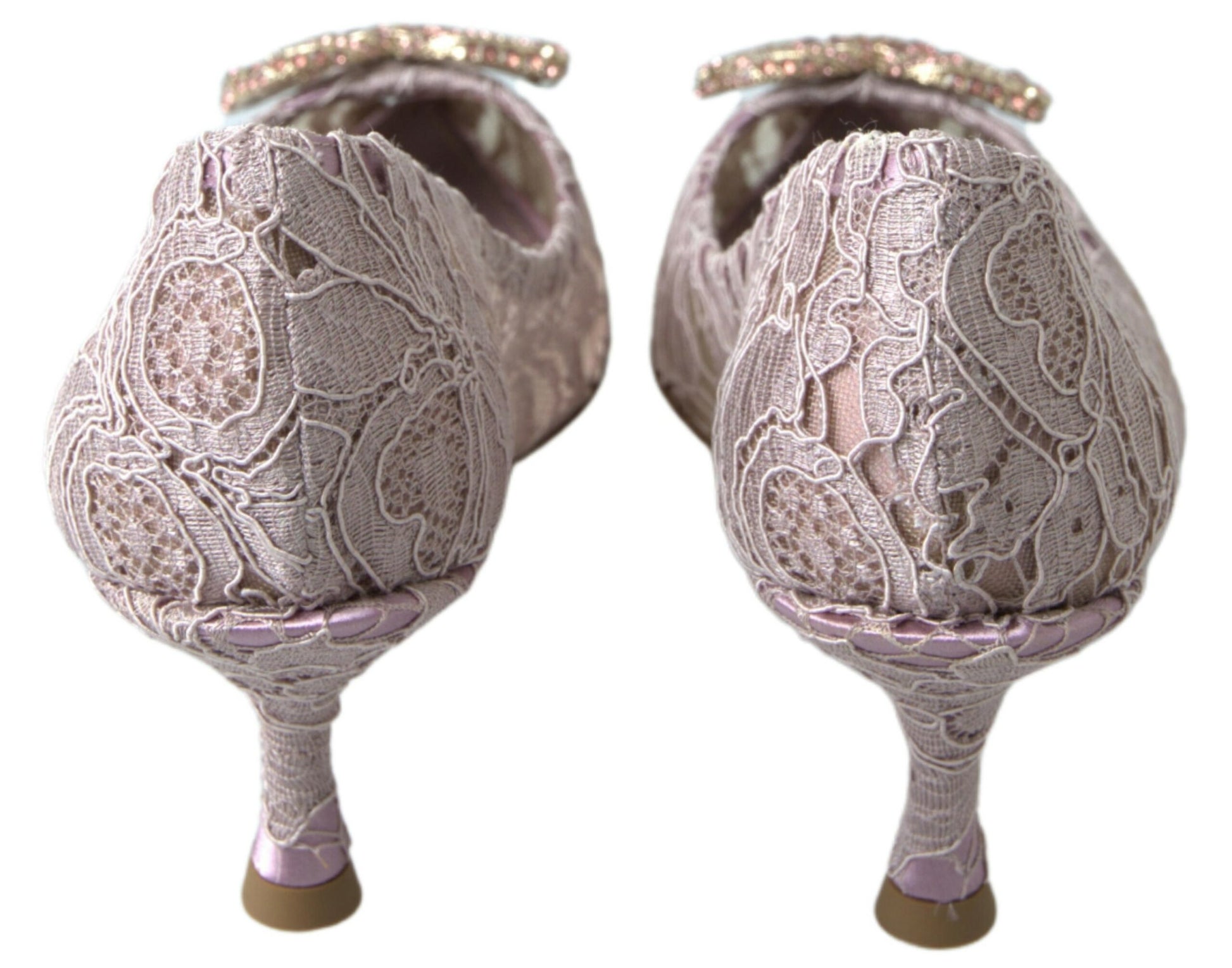 Pair of ornate women's shoes with lace and embroidery details