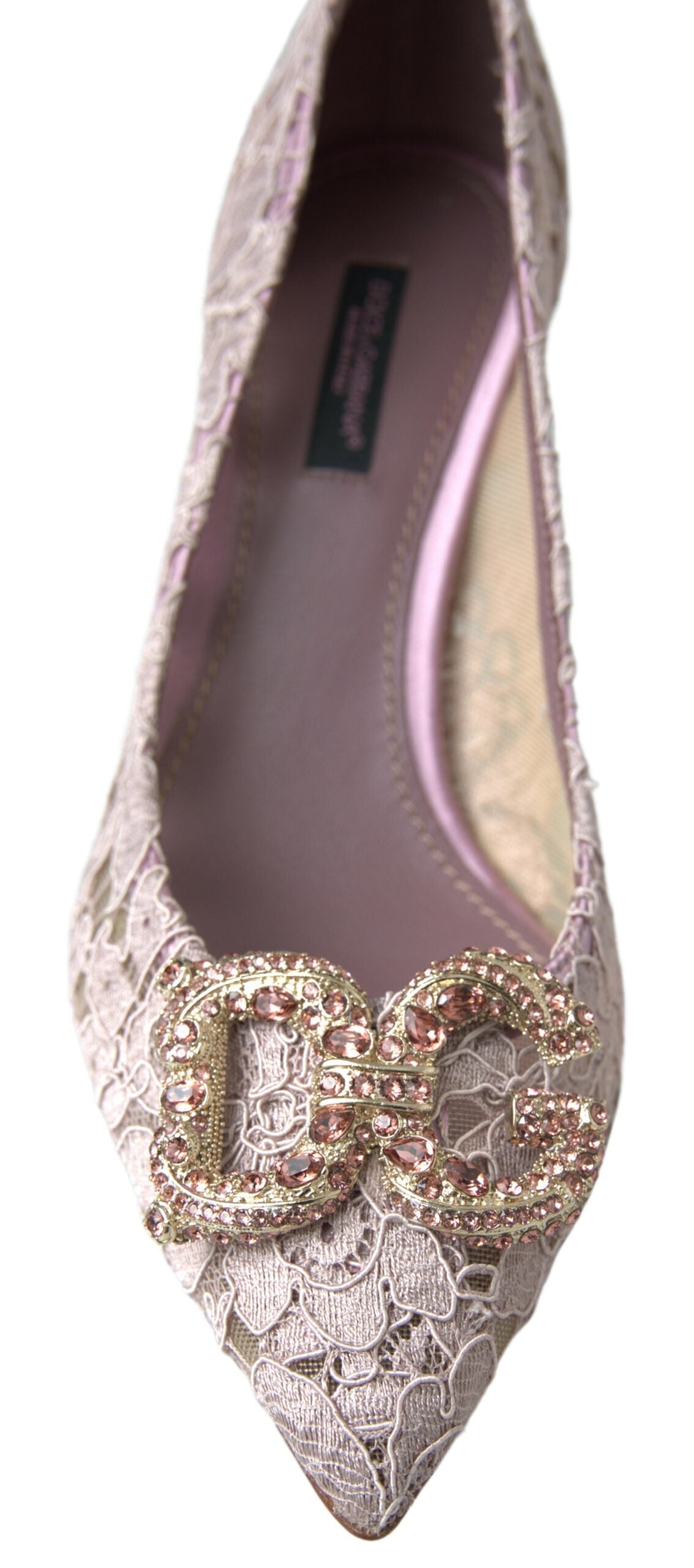 Pair of women's shoes with embellishments and a pointed toe design
