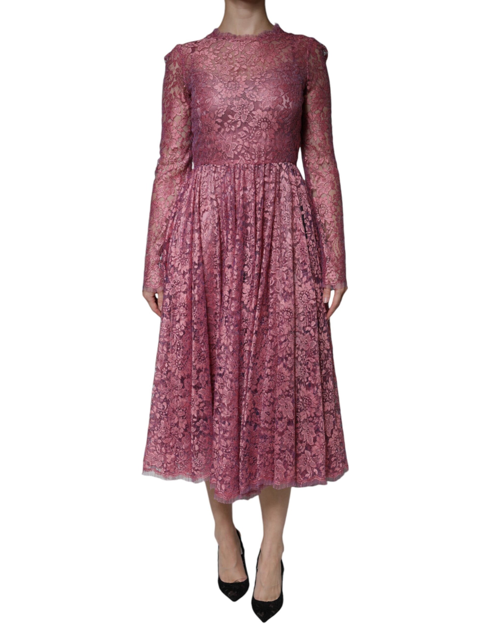 A long sleeved midi dress with floral lace pattern and pink color