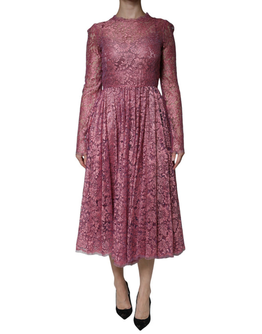 A long sleeved midi dress with floral lace pattern and pink color