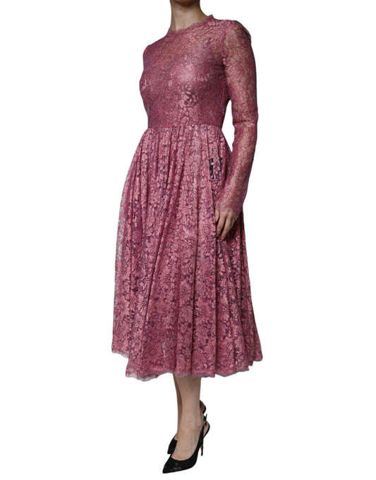 A long sleeved midi dress with floral lace pattern and pink color