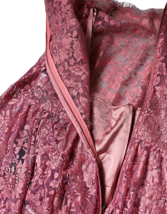 A pink floral lace midi dress with long sleeves