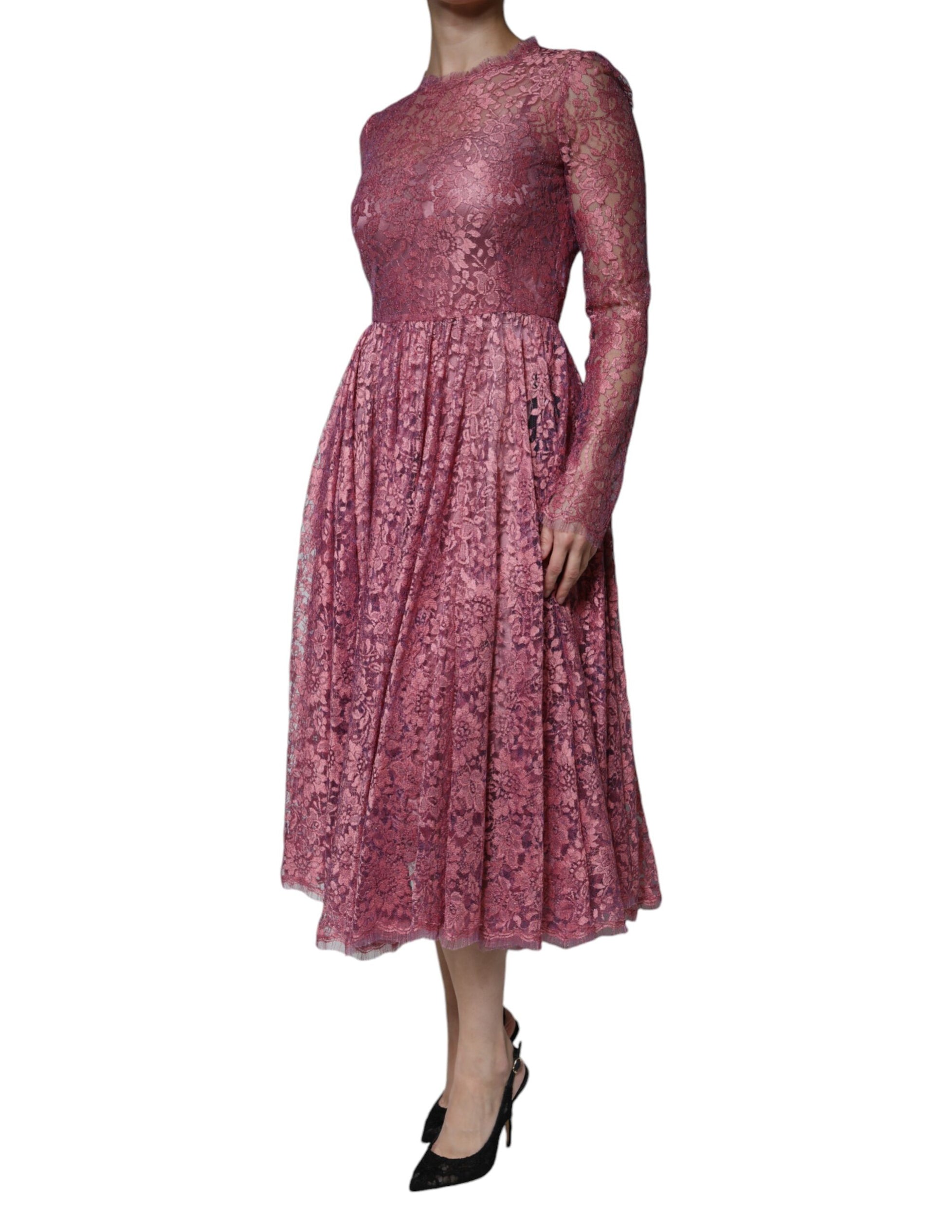 A long sleeved midi dress with floral lace pattern and pink color