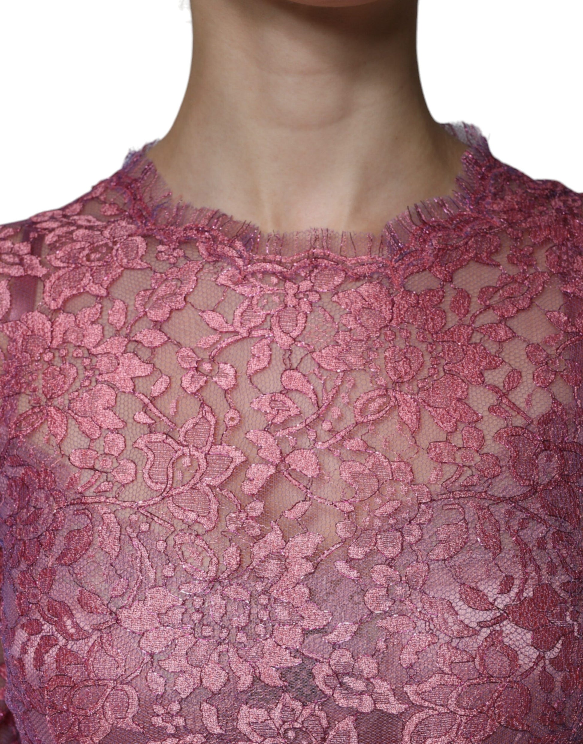 A pink floral lace long sleeve midi dress by Dolce & Gabbana