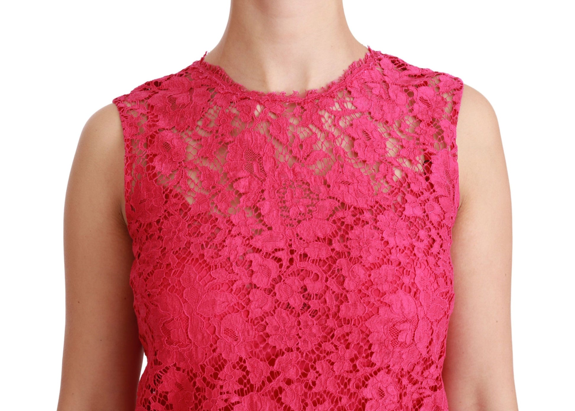 A pink lace dress with floral pattern, sleeveless and fitted