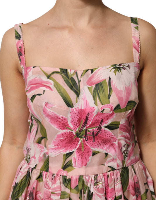 A pink floral print midi dress with lily design, sleeveless, from the brand Dolce & Gabbana