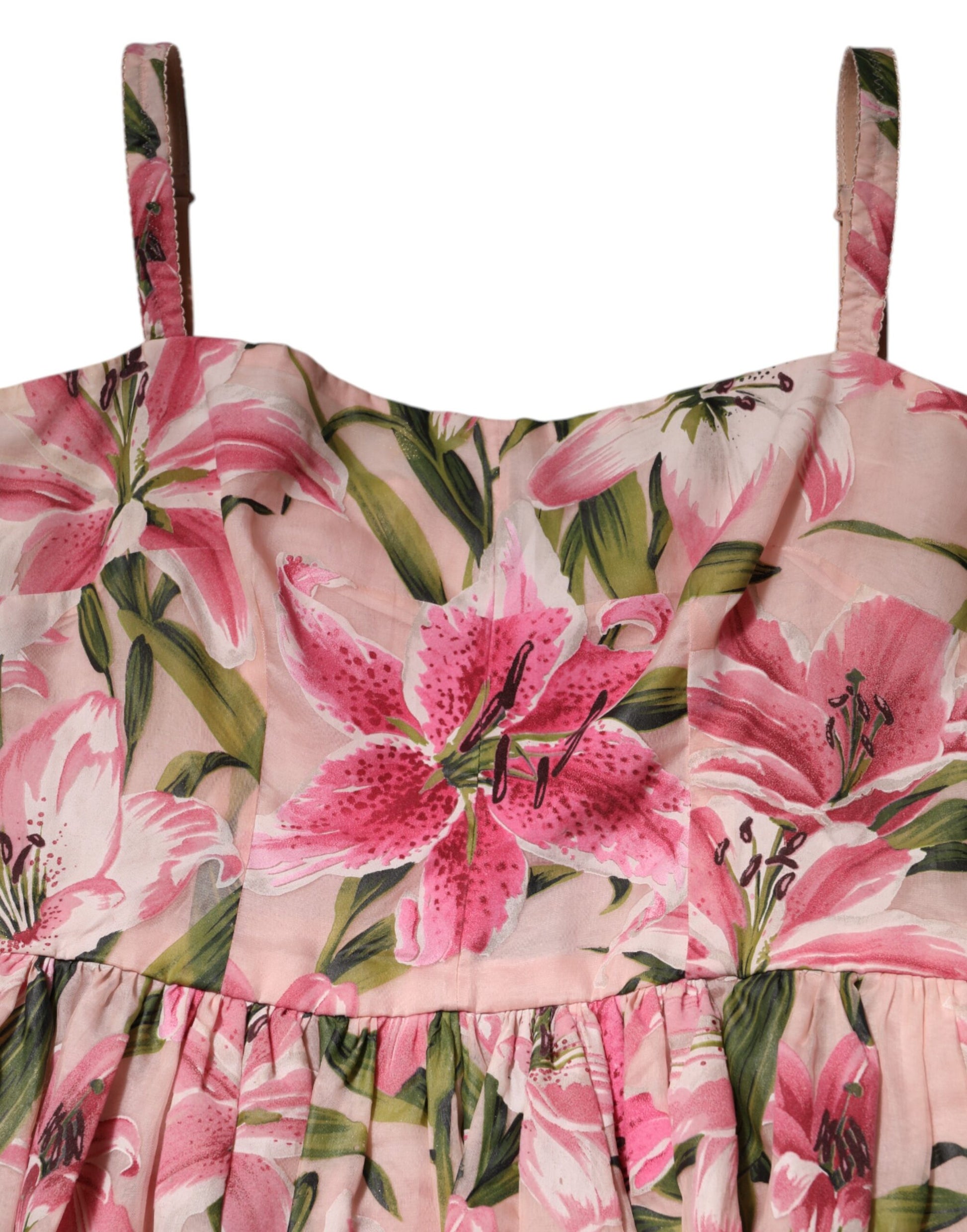 A pink floral print midi dress with sleeveless design