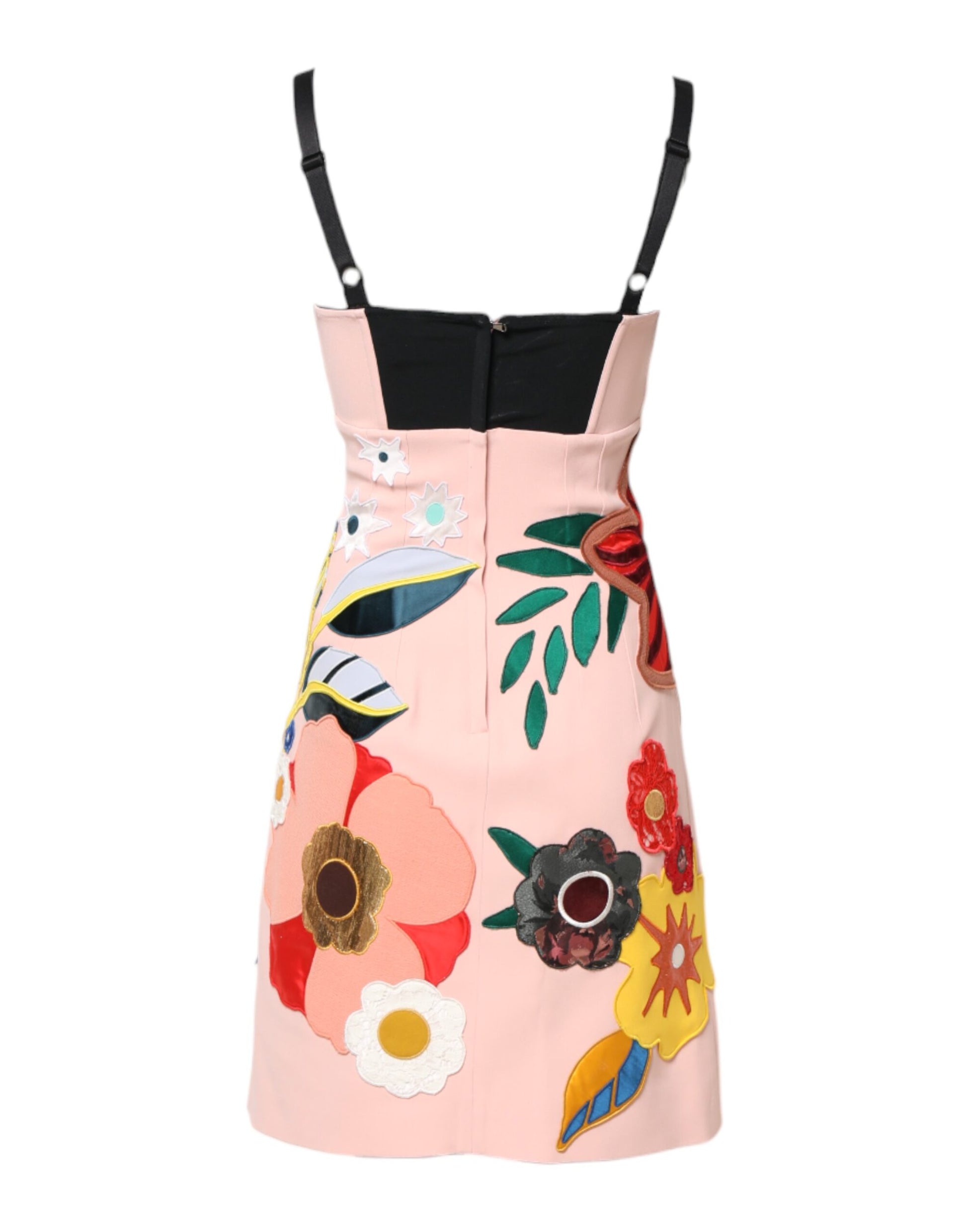A pink floral print mini dress with spaghetti straps