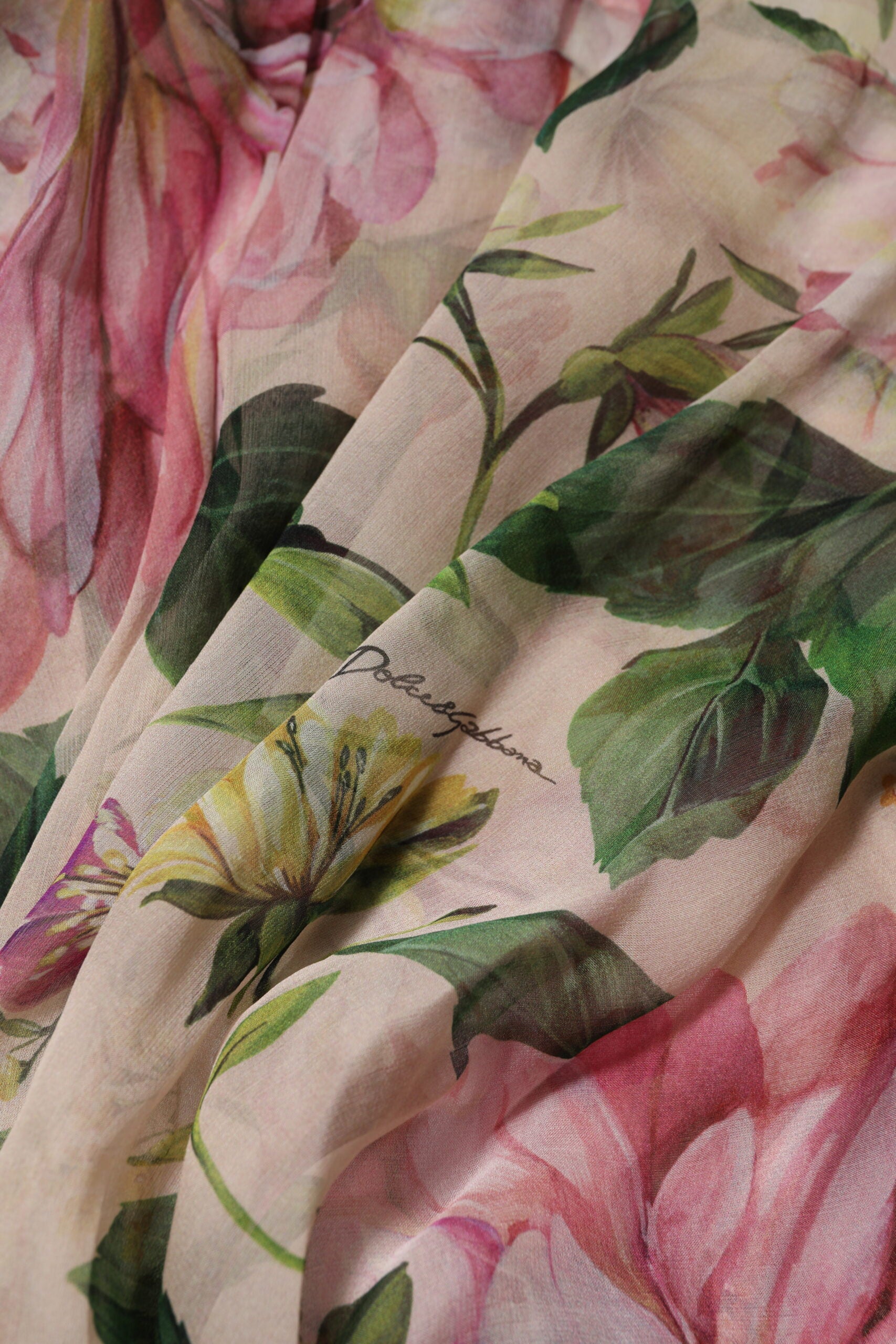 A pink floral print tiered long maxi dress by Dolce & Gabbana
