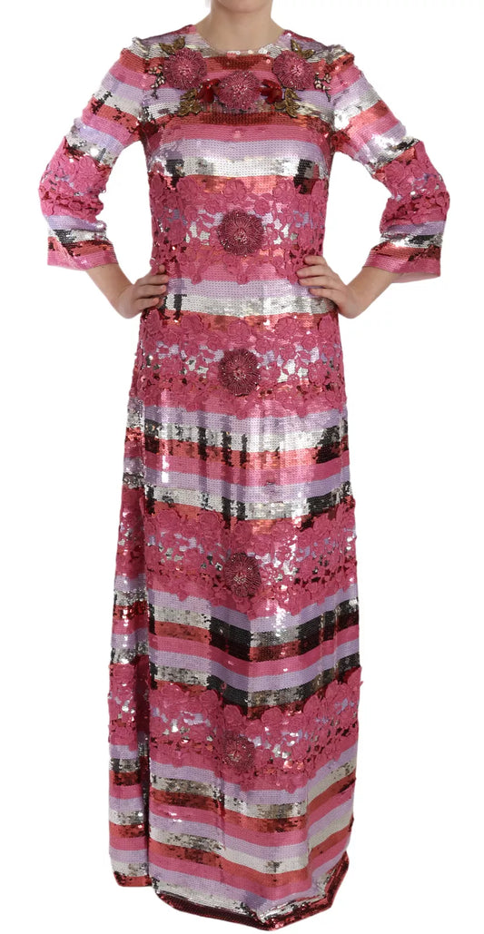 A long pink sequin dress with floral patterns and crystals