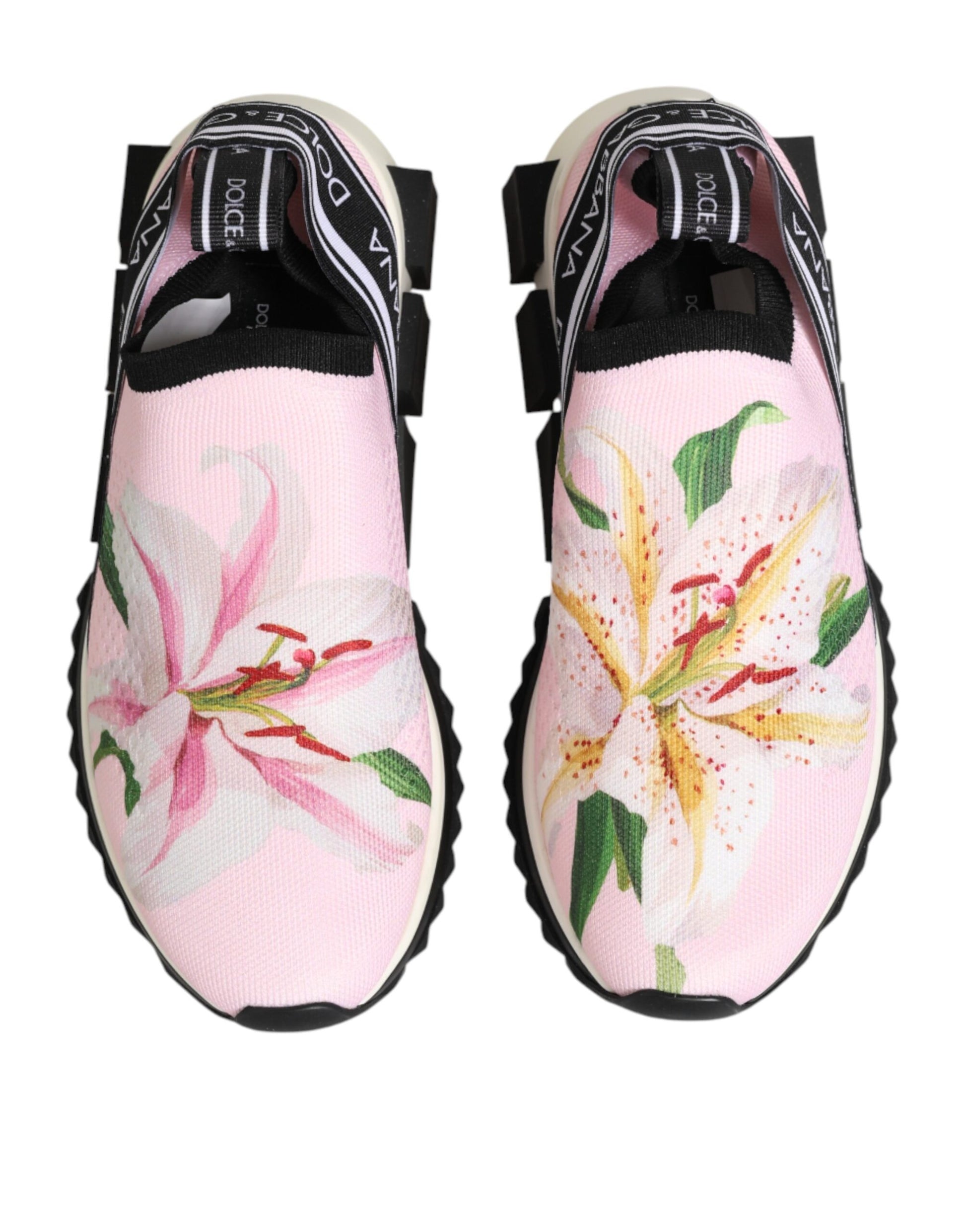 Pair of pink floral slip on shoes