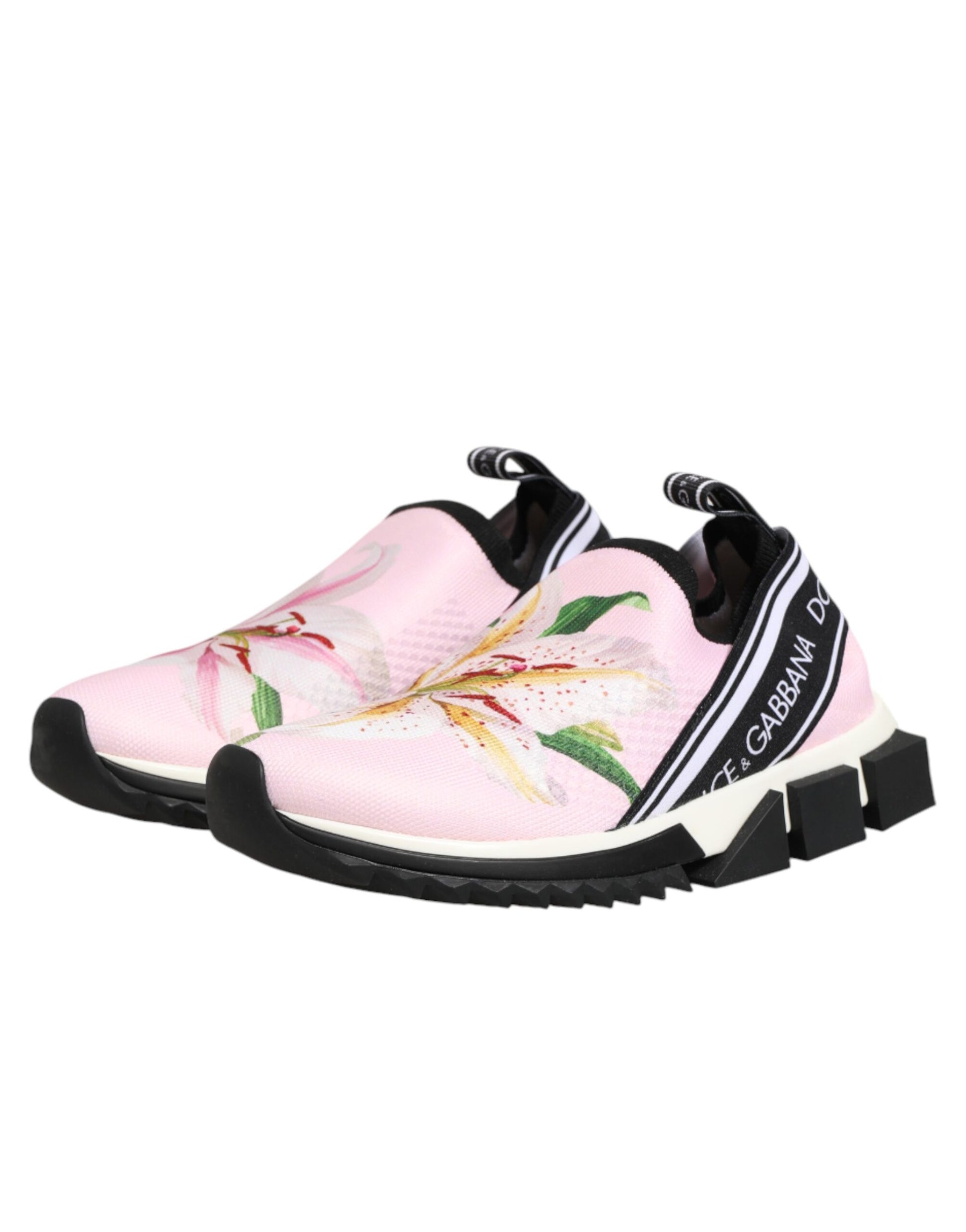 Pink athletic shoe with floral pattern on side