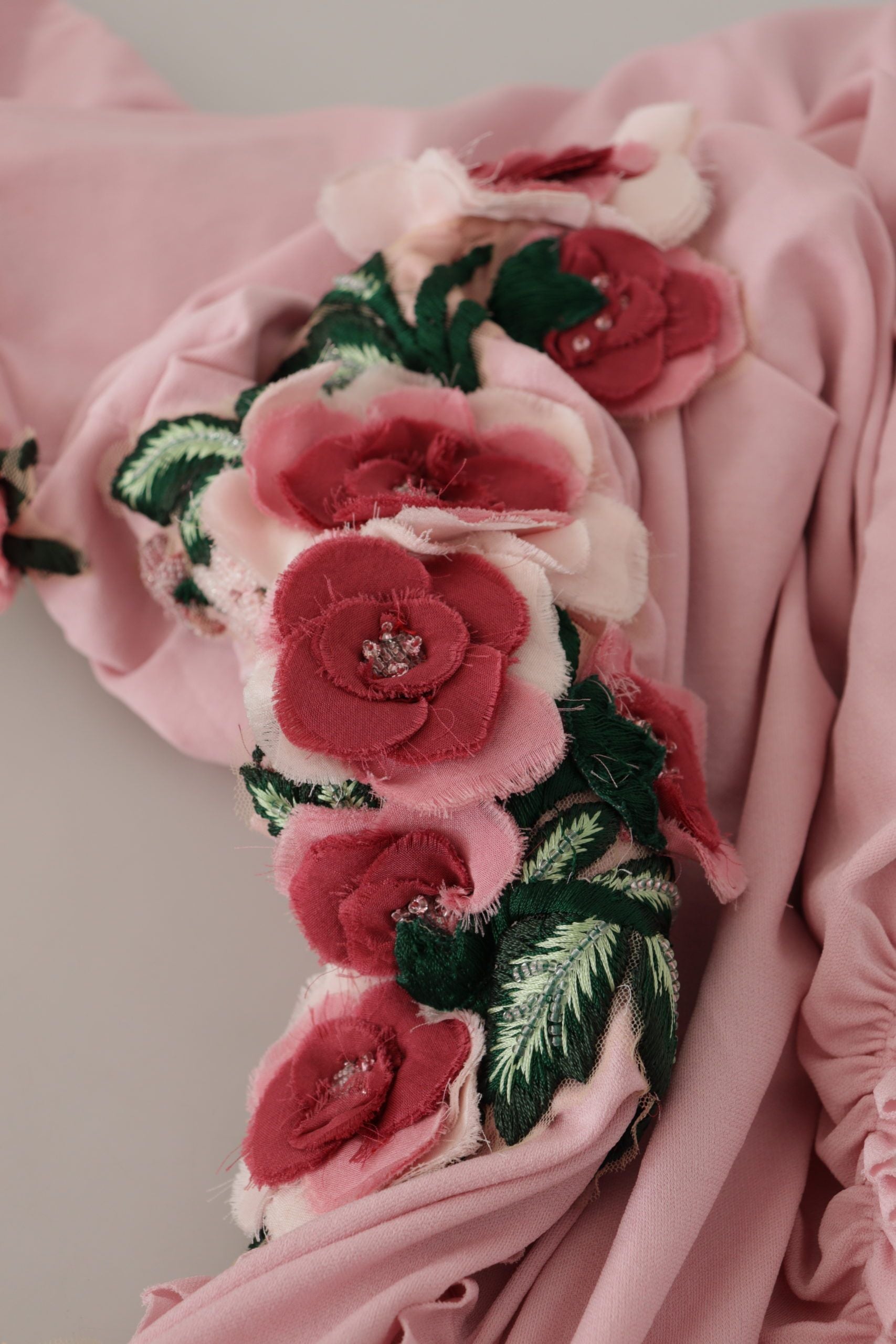 Pink scarf with red flowers embroidered on edge