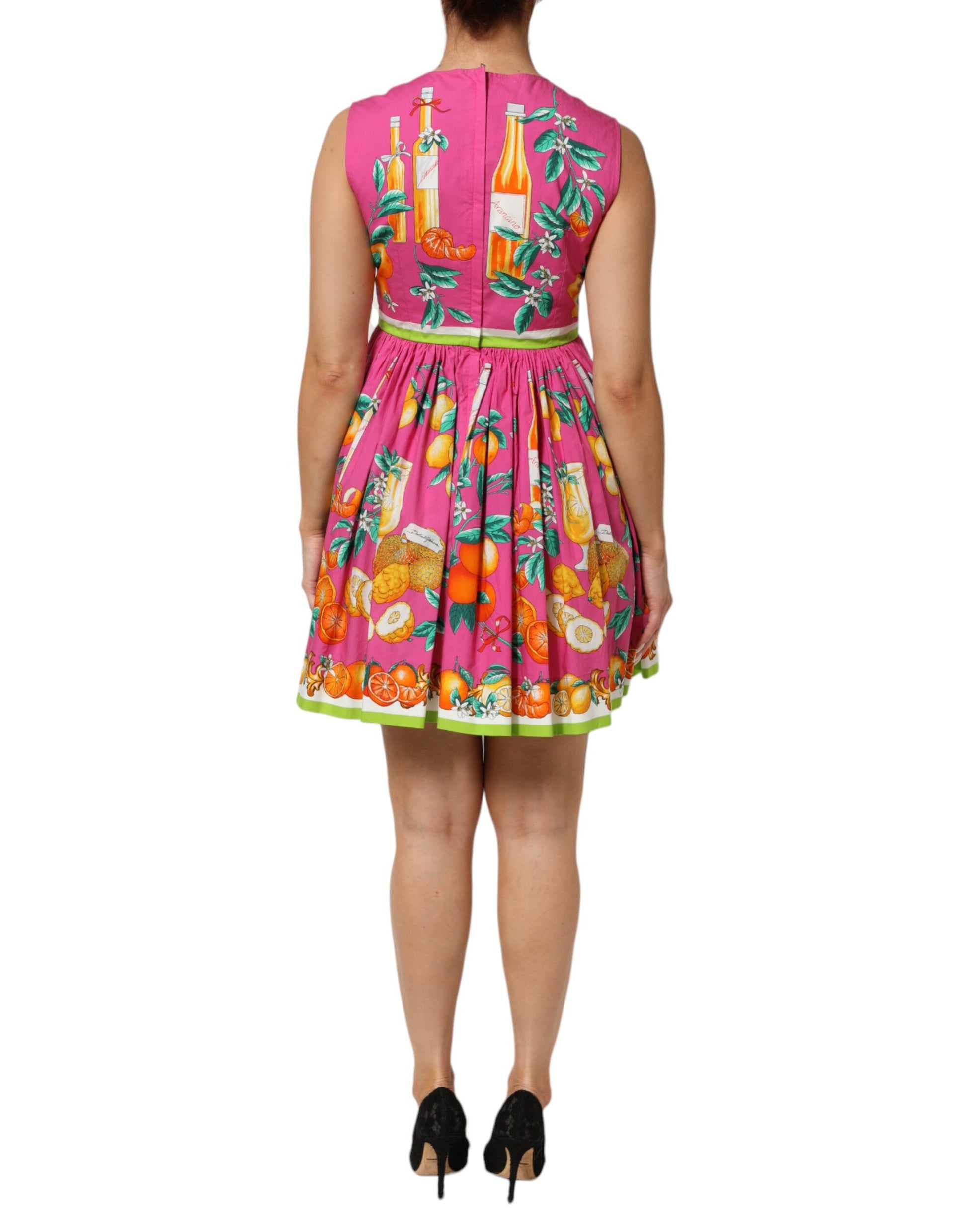 Pink fruit print mini dress with green trim and short sleeves