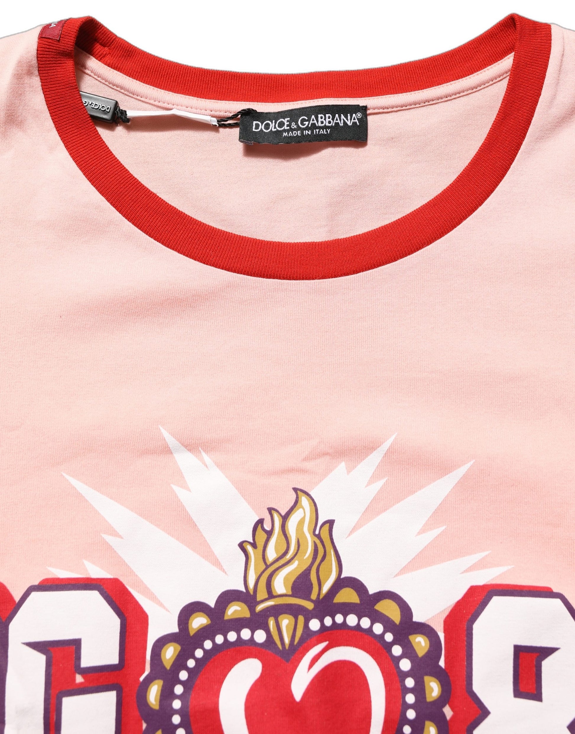 A pink graphic print crew neck t-shirt with a heart design