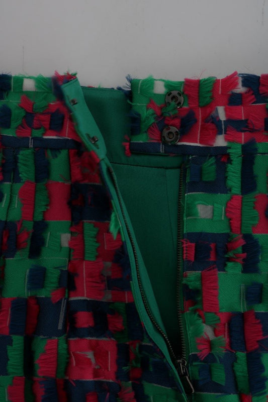 Colorful quilted fabric with fringe detailing
