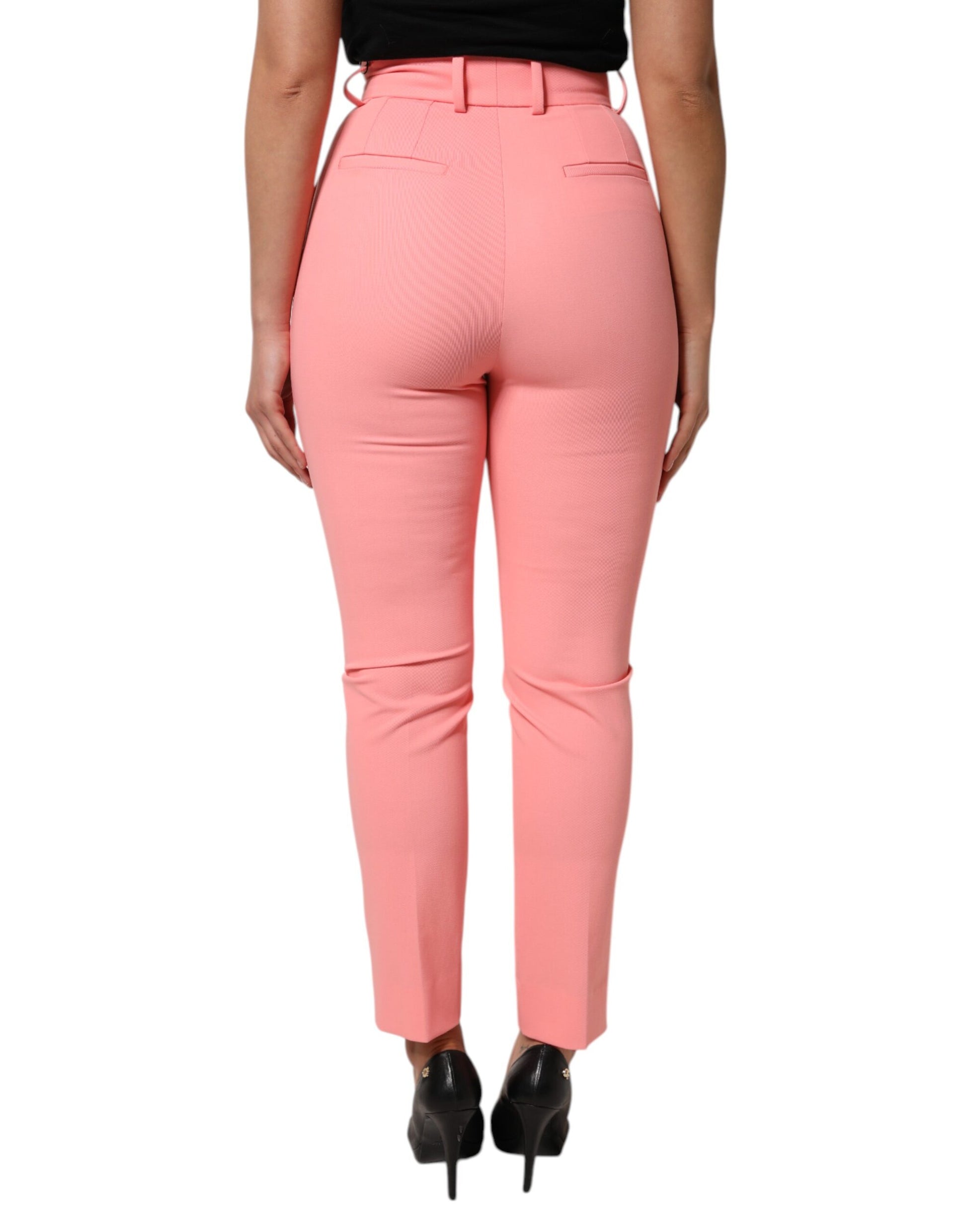 Pair of pink high waist tapered trousers with a slim fit