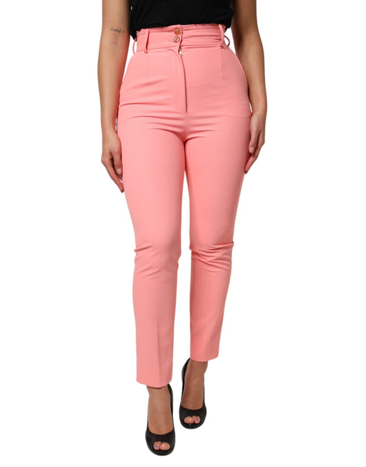 Pair of high waist pink trousers with tapered legs