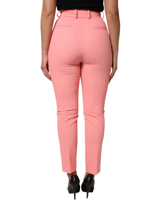 Pair of high waisted pink trousers with tapered legs