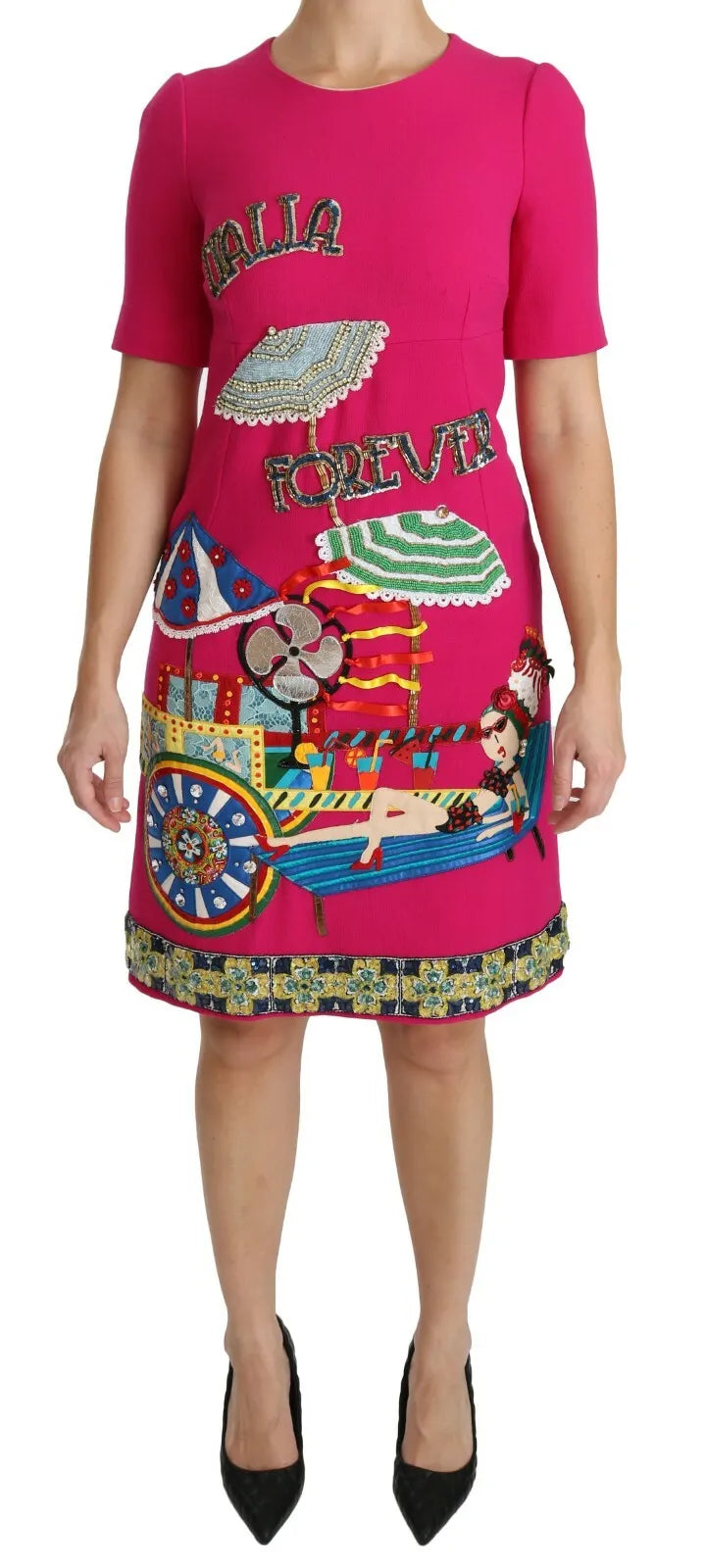 A pink dress with a crystal embellished design and the words "Italia Forever" written on it