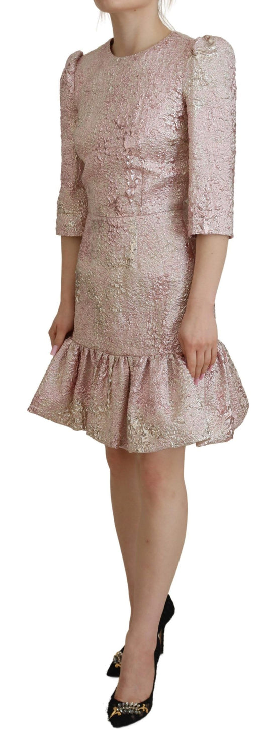 A pink sequined midi dress with a ruffled hem and sleeves