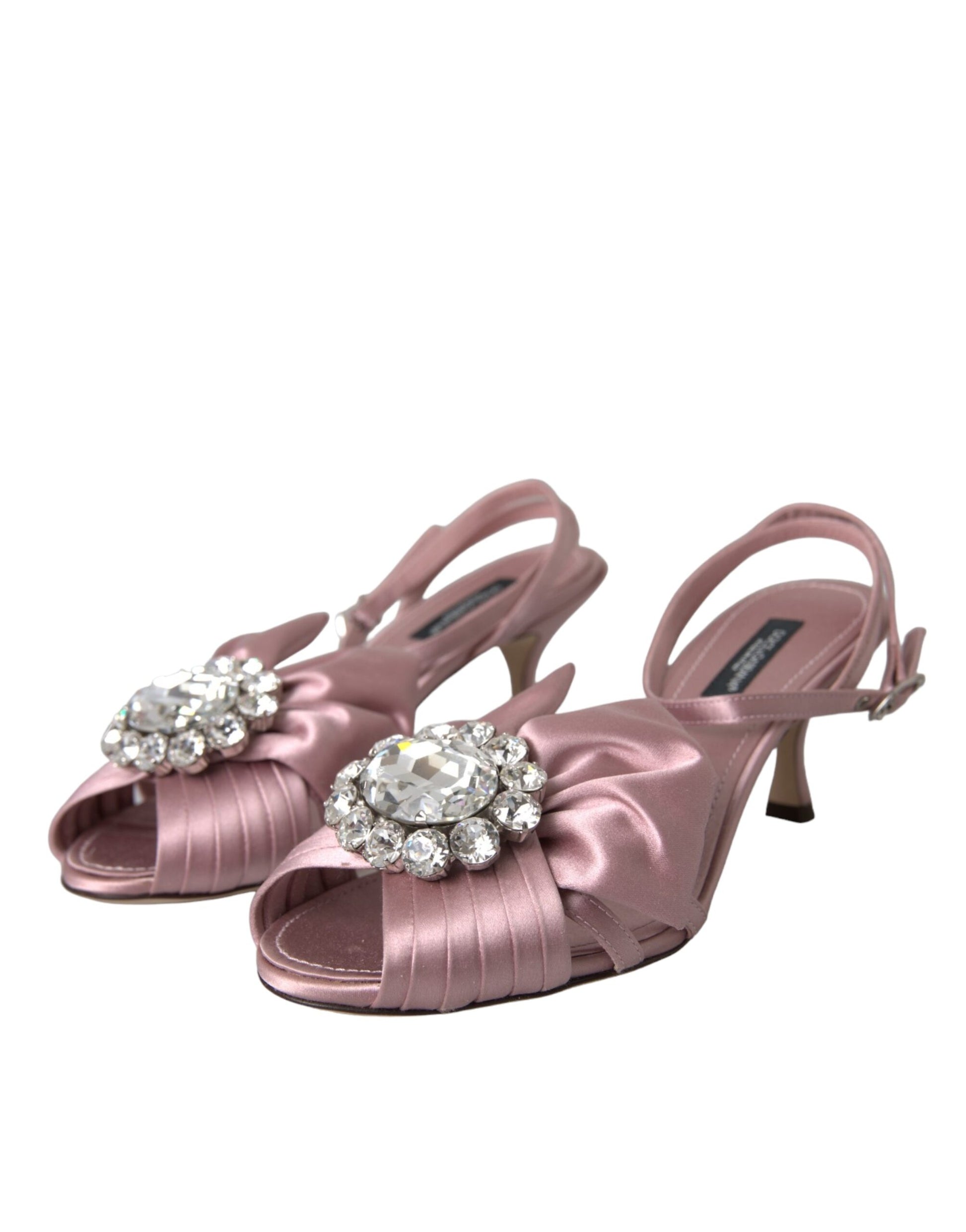 Pair of pink strappy heels with rhinestone embellishments