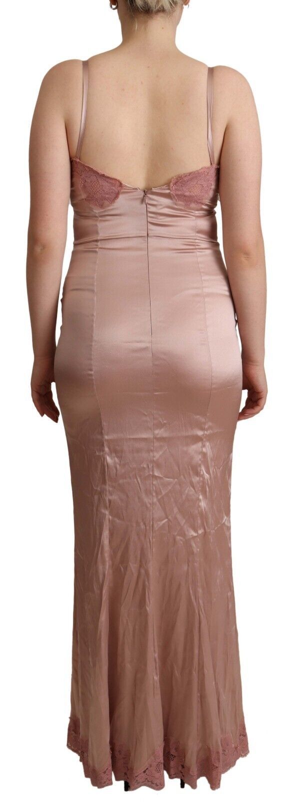 A long pink lace dress with a body-hugging silhouette
