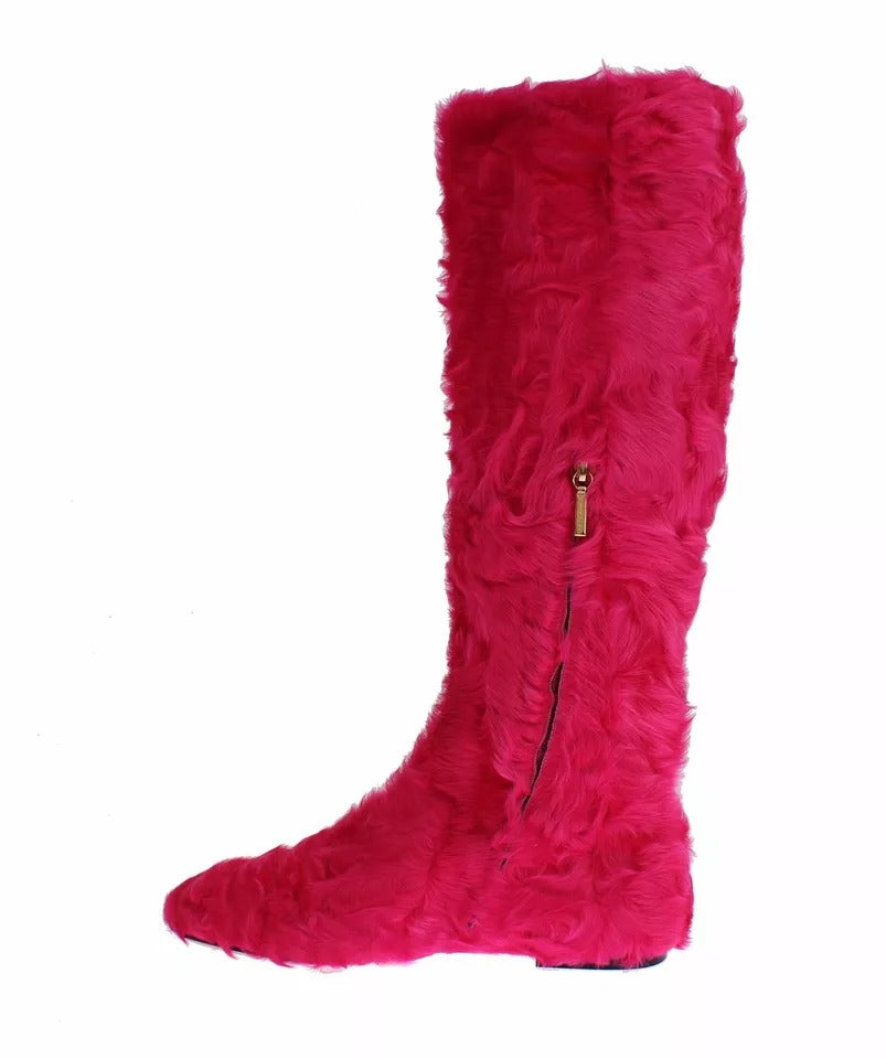Pink furry boot with zipper closure