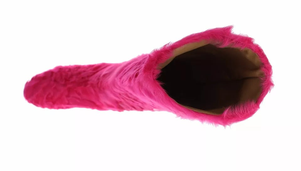 Pink fuzzy slipper with hole in toe