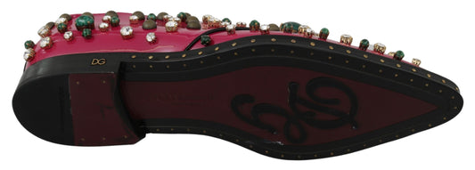 Red shoe with gold accents and studs on top
