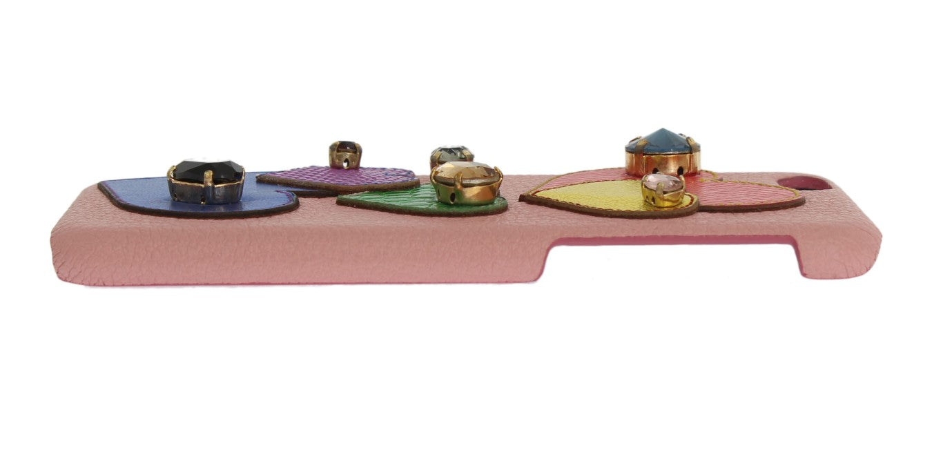Pink toy guitar with colored buttons on neck