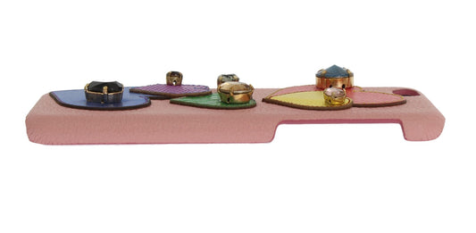 Pink toy guitar with colored buttons on neck