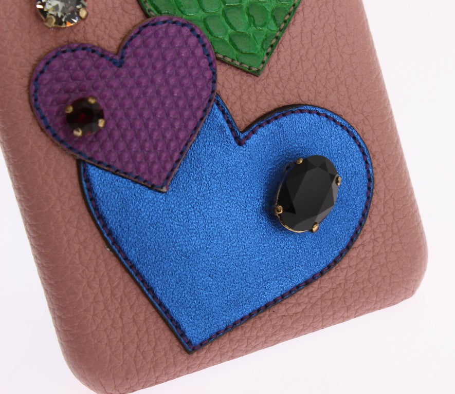 Pink leather case with blue heart embroidery and black gemstone button closure