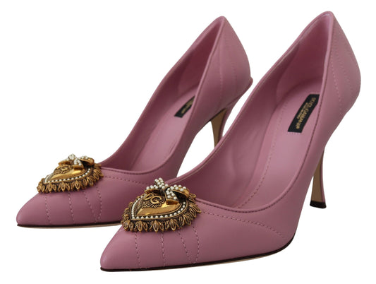Pair of pink high heel shoes with embellishments on toes
