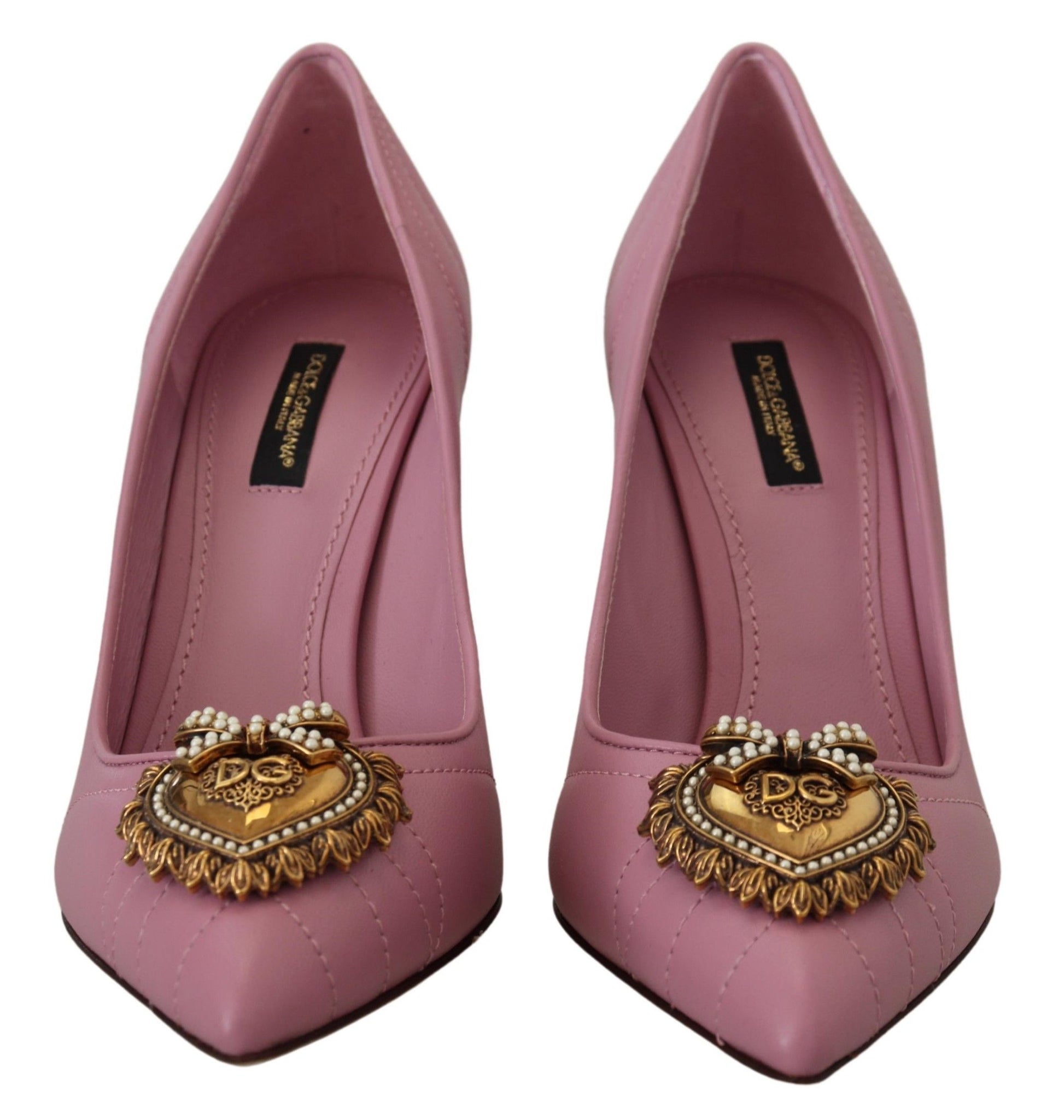 Pair of pink high heel shoes with embellished toe cap
