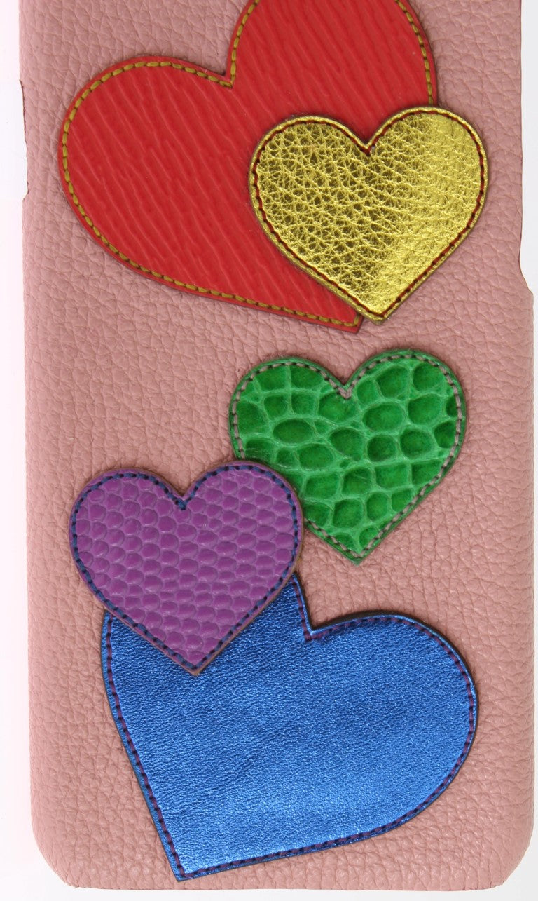 Pink phone case with hearts in red, yellow, green and blue