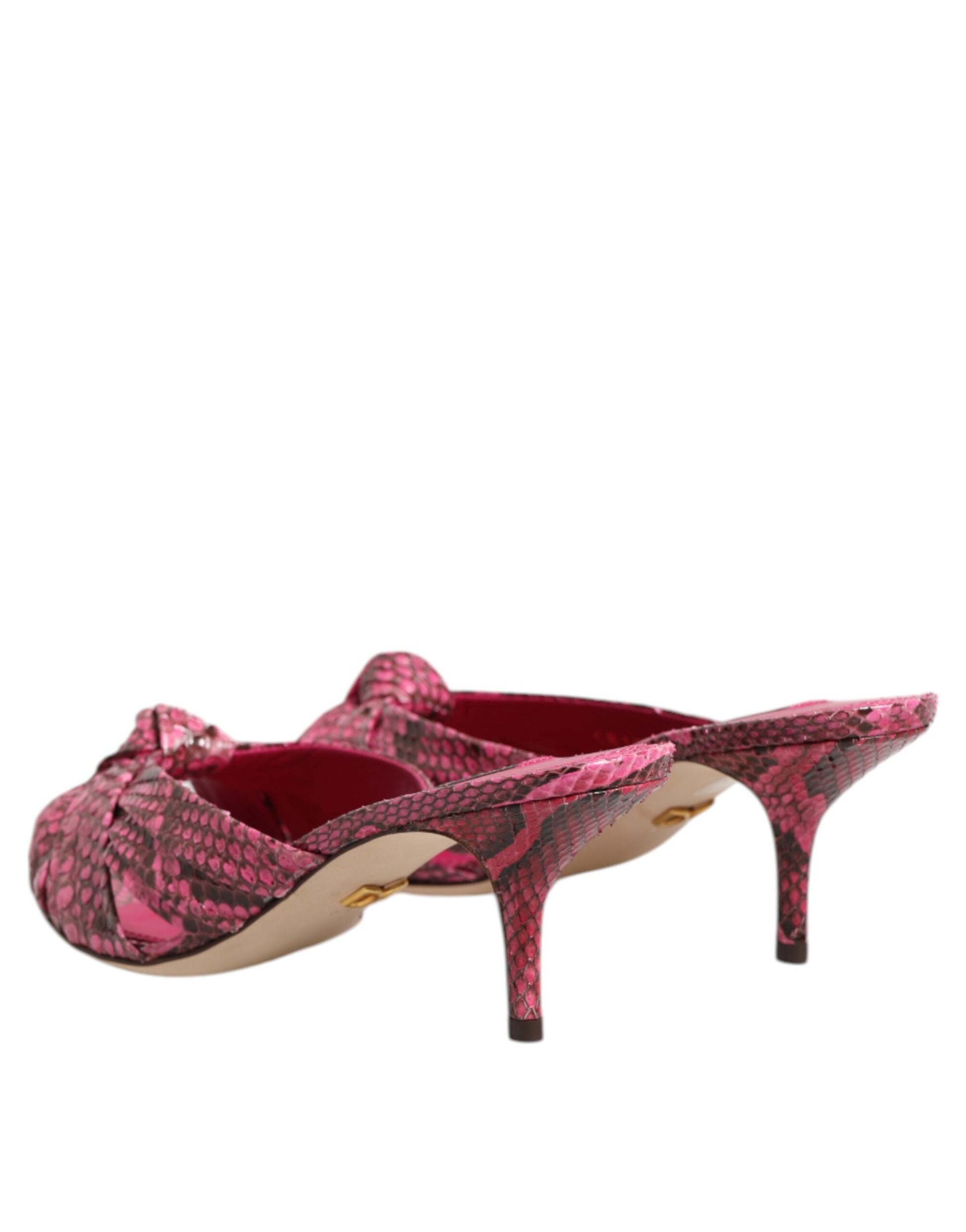 Pair of high heel shoes with pink and black patterned design