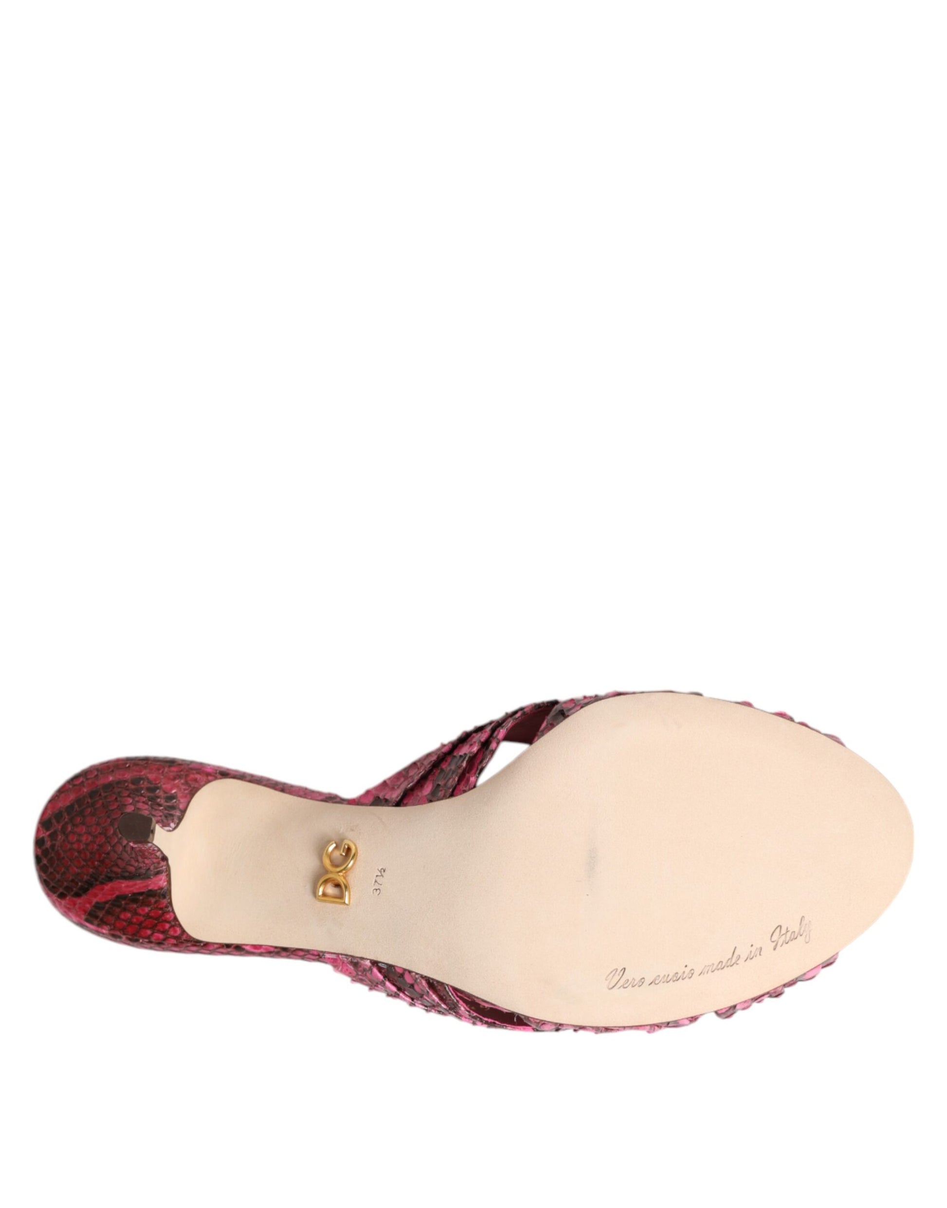 The shoe is red with a gold buckle on top