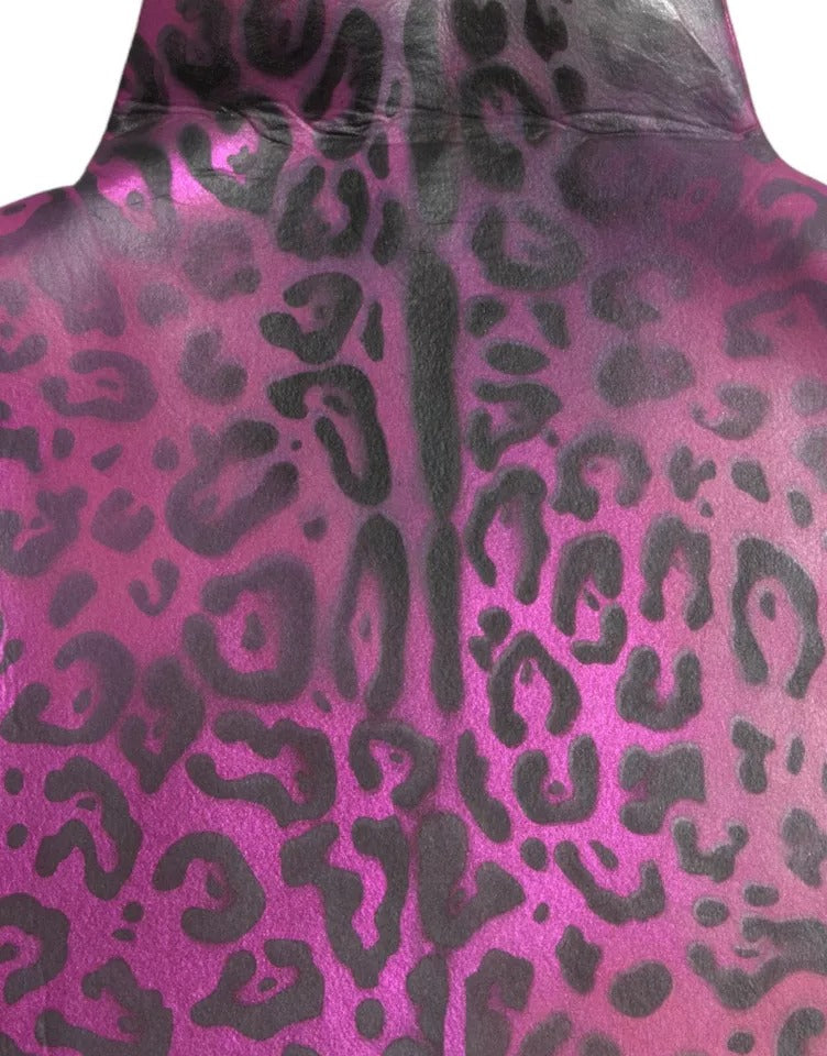 A pink leopard print polyester shift midi dress