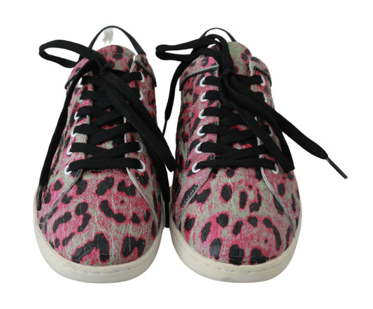 Pair of pink and black baby shoes with laces