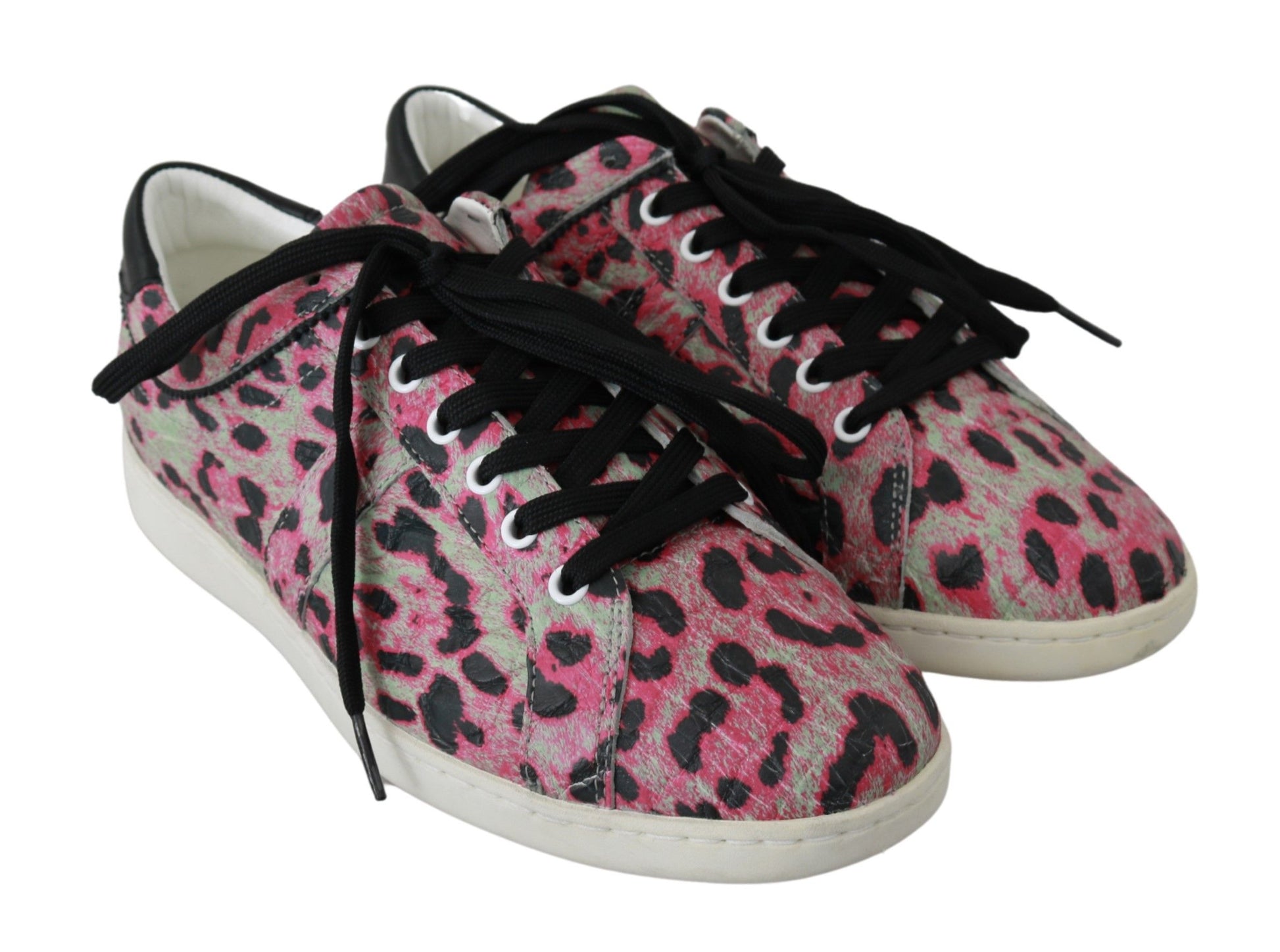 Pair of pink and black sneakers with laces
