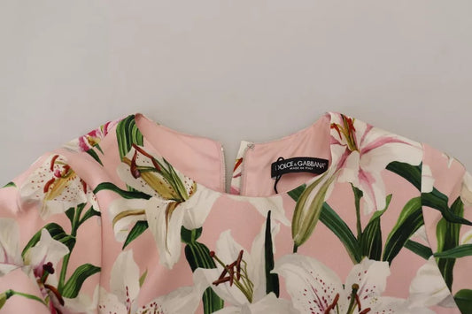 A pink floral dress with a sheer viscose fabric