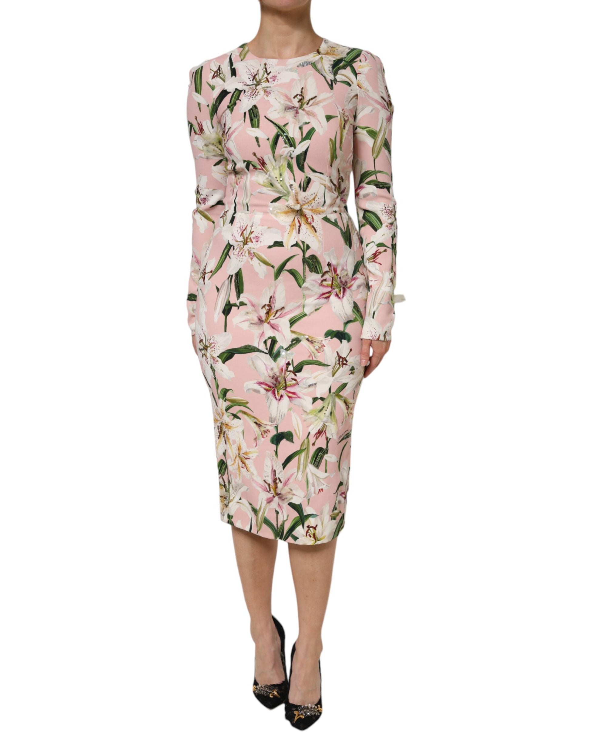 A pink midi dress with floral pattern and stretchy fabric, designed by Dolce & Gabbana