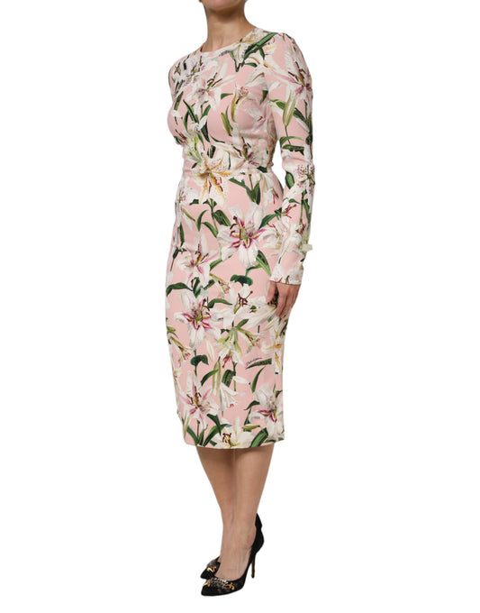 A pink midi dress with lily print and stretchy fabric, designed by Dolce & Gabbana