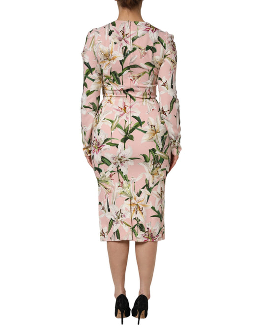 A pink midi dress with floral pattern and stretchy fabric, designed by Dolce & Gabbana