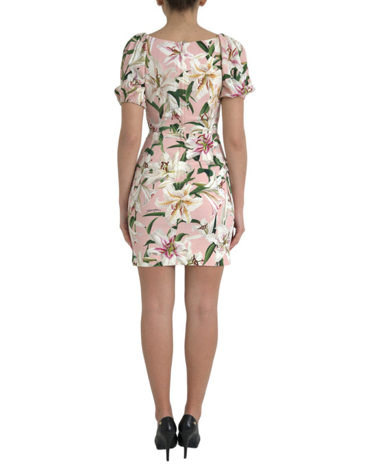 A pink floral dress with a sheer back and short sleeves